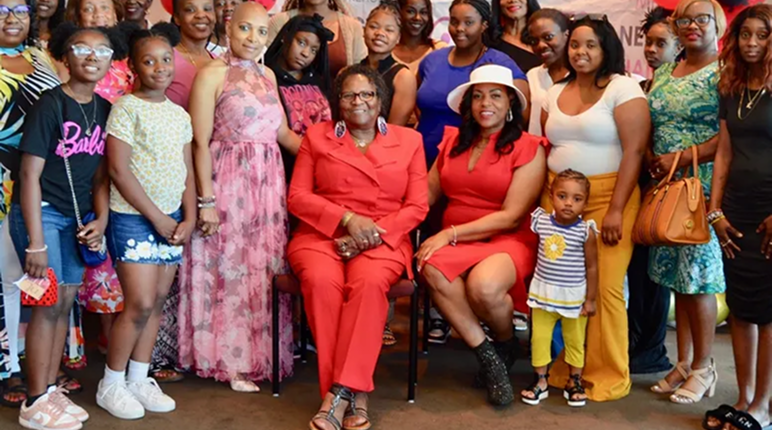 Family gathering with colorful outfits